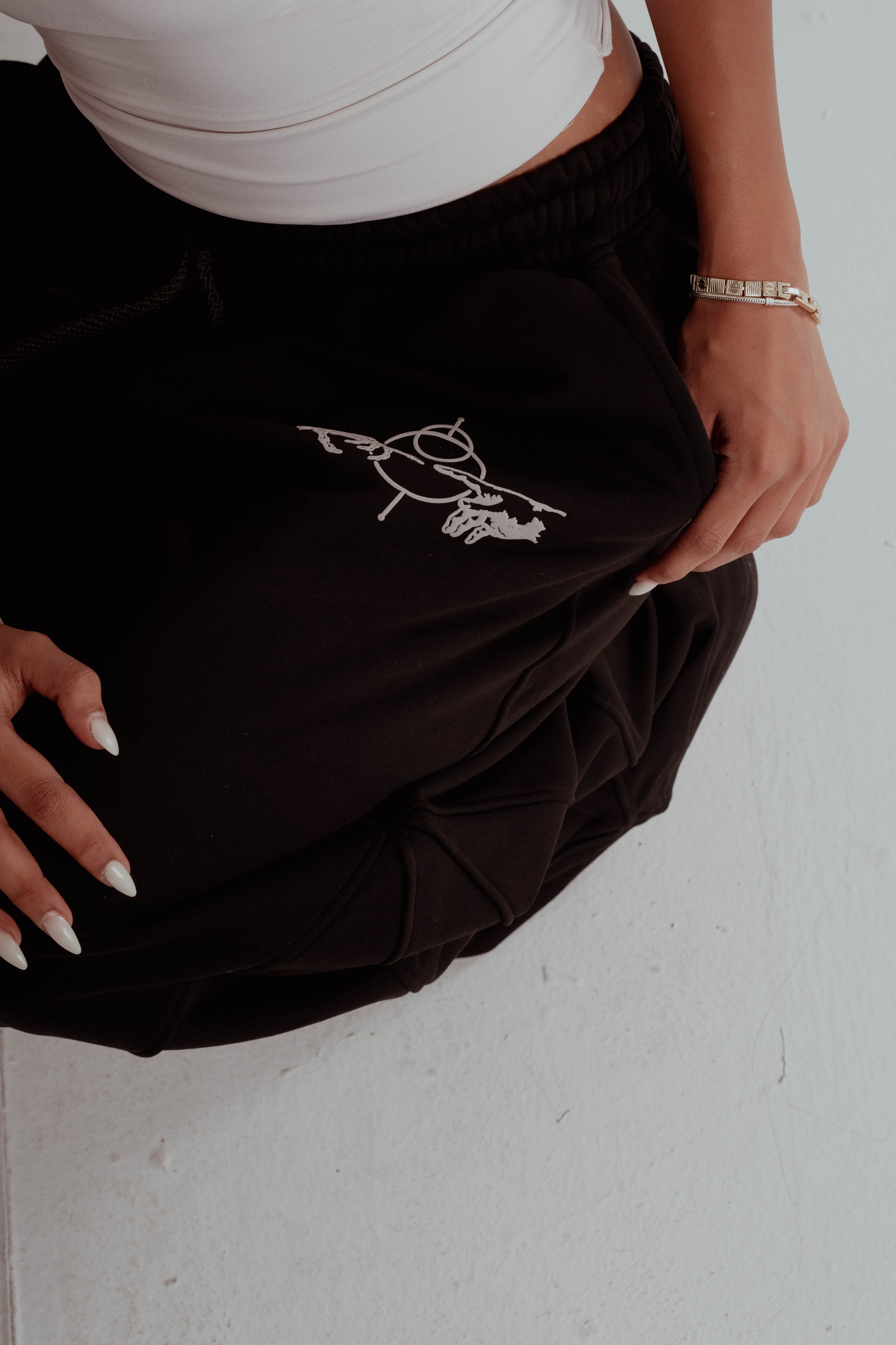 BLACK GROOVE SWEATPANTS